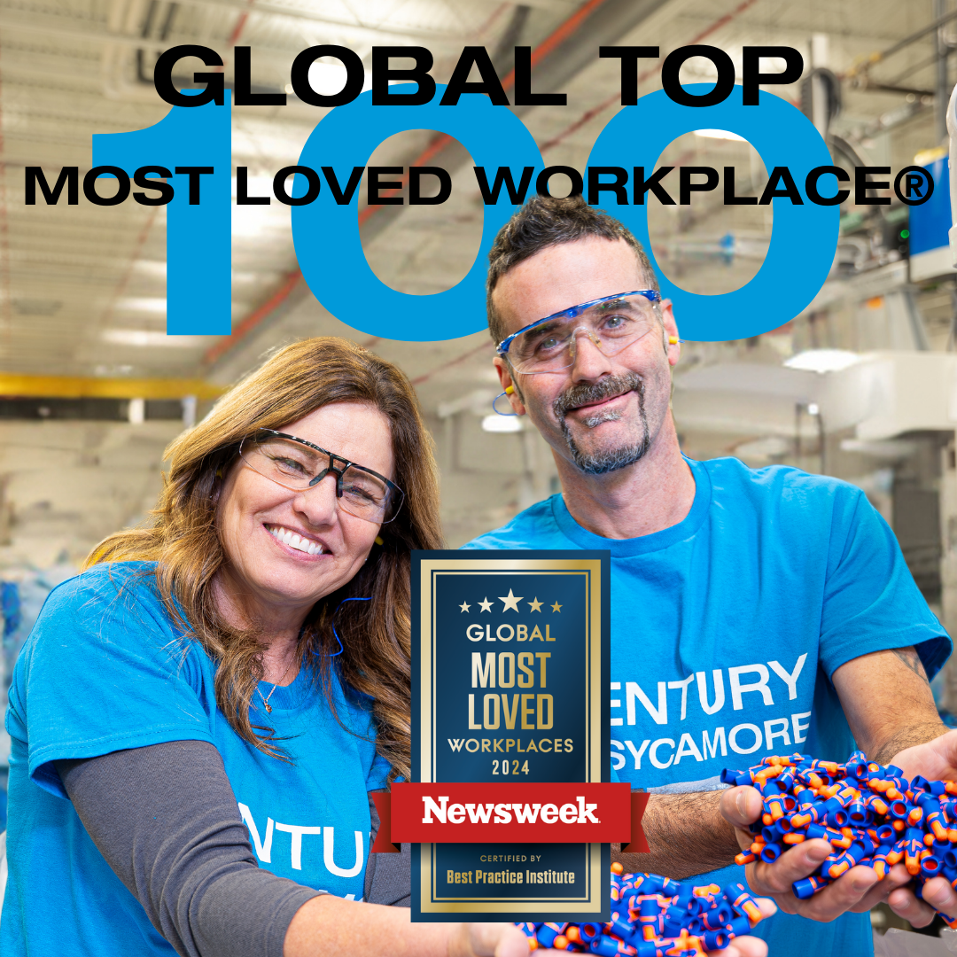 Image of employees smiling with badge